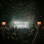 people gathering on concert field