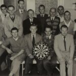 person holding dartboard